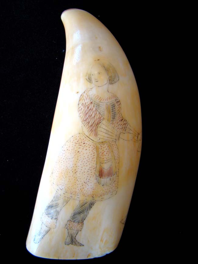 A 19th century American sailor Scrimshawed  Whale's Tooth with Lady and a Ship